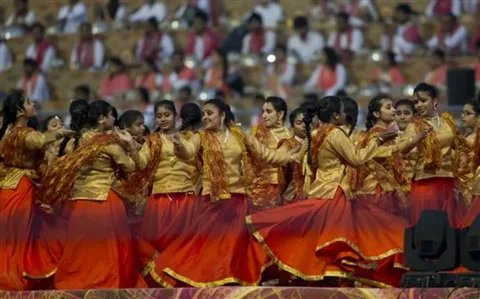Students participating in various sports activities on school ground with enthusiasm